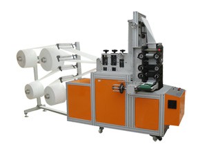 Máquina automática para fabrico de respiradores descartáveis dobráveis